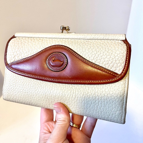 Dooney & Bourke Handbags - Dooney & Bourke Vintage All-Weather Leather Cream & Brown Flap Wallet